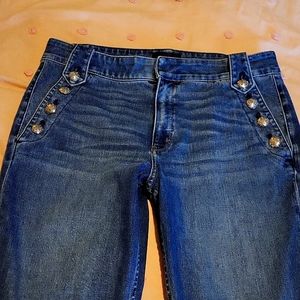 White house black market jeans with adorning silver buttons!